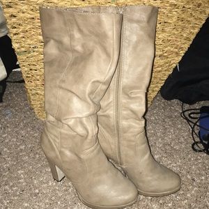 Below knee heeled boots